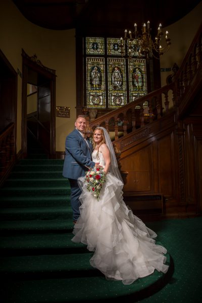 04 brided groom staircase chateau impney droitwich john fox wedding photography